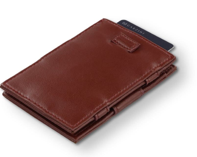 Front view of Cavare Magic Wallet Card Sleeve Cactus in Cactus Burgundy with pull tab and card pulling out