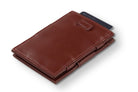 Front view of Cavare Magic Wallet Card Sleeve Cactus in Cactus Burgundy with pull tab and card pulling out