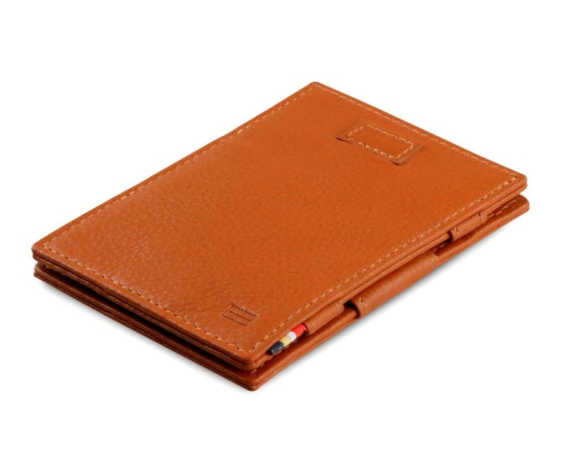 Front view of Cavare Magic Wallet Card Sleeve Nappa  in Cognac Brown with pull tab.