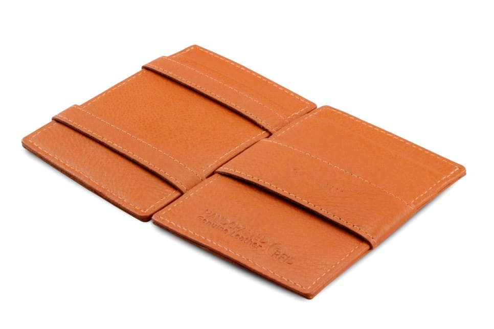 Open Cavare Magic Wallet Card Sleeve Nappa  in Cognac Brown with pull tab, and money straps.