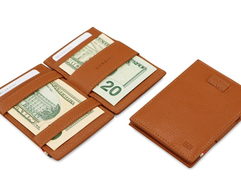 Front and open view of Cavare Magic Wallet Card Sleeve Nappa in Cognac Brown with pull tab, and money straps.