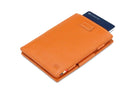 Front view of Cavare Magic Wallet Card Sleeve Nappa in Cognac Brown with pull tab and card pulling out.