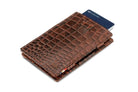 Front view of Cavare Magic Wallet Card Sleeve in Croco Brown with pull tab and card pulling out.