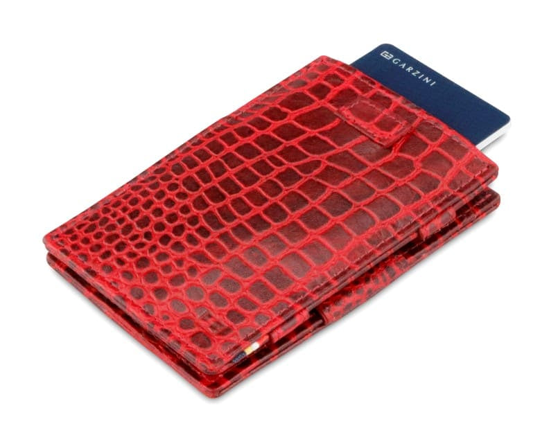 Front view of Cavare Magic Wallet Card Sleeve in Croco Burgundy with pull tab and card pulling out.