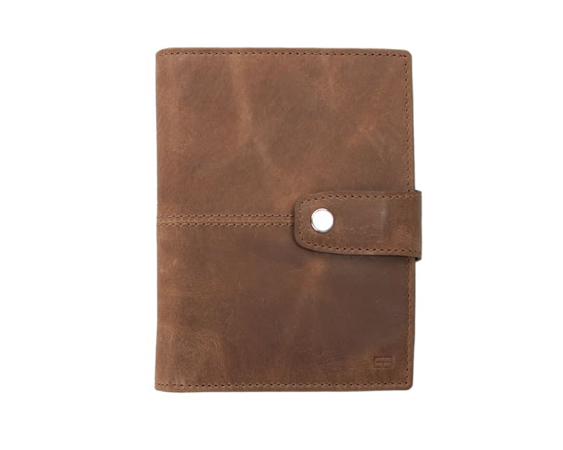 Frontview of the AirTag Passport Holder in Brushed Brushed Brown.