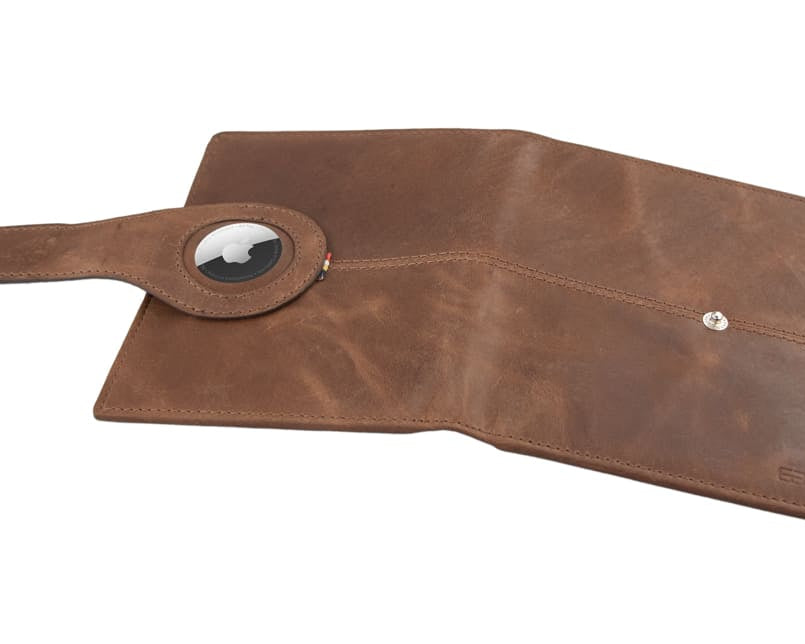 Open outside view with AirTag of the AirTag Passport Holder in Brushed Brushed Brown.