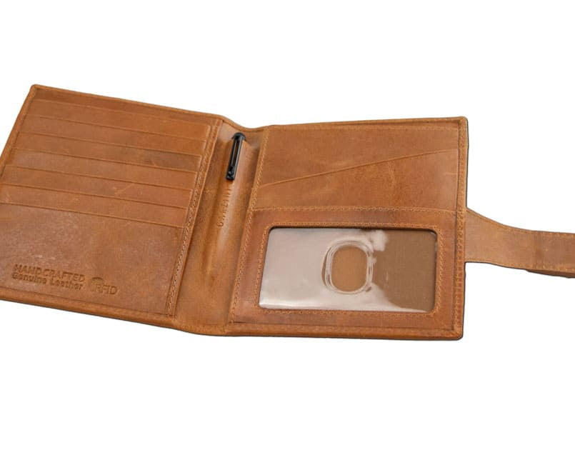 Open inside view with AirTag of the AirTag Passport Holder in Brushed Brushed Cognac