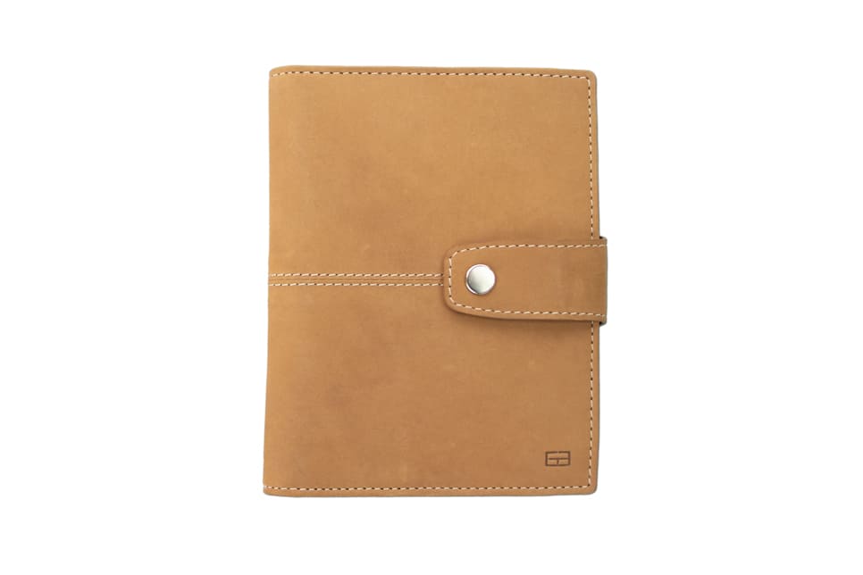 Frontview of the AirTag Passport Holder in Vintage Camel Brown.