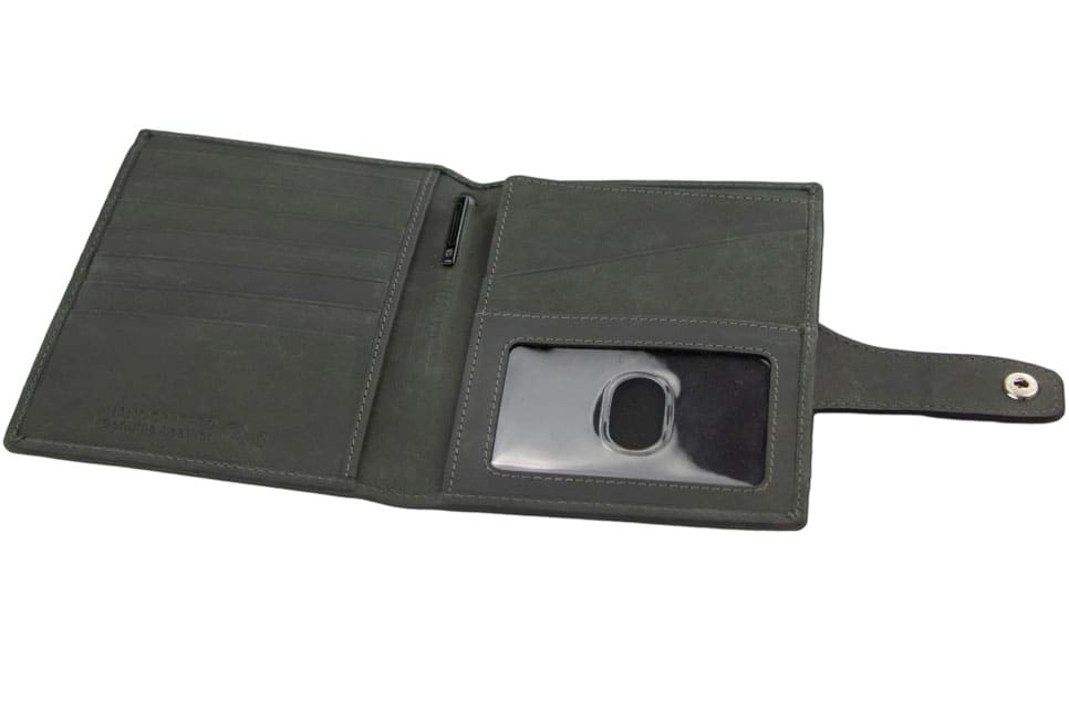 Open inside view with AirTag of the AirTag Passport Holder in Vintage Carbon Black