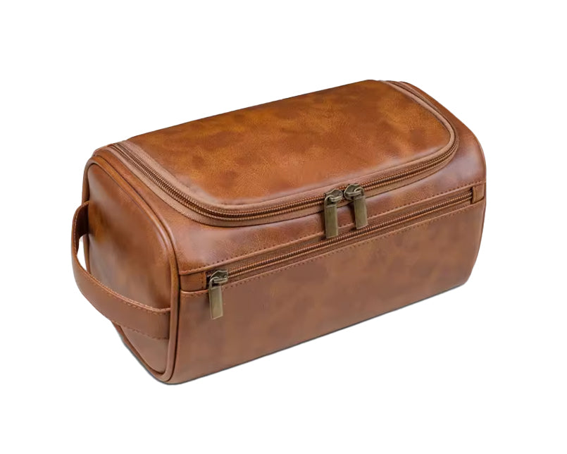 Cognac-colored vegan leather Garzini Toiletry Bag, front side view for elegant and functional travel storage.