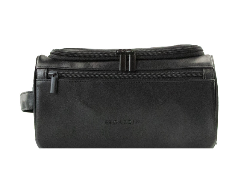 Close-up of Black Garzini Toiletry Bag front side, highlighting premium vegan leather and black zipper.
