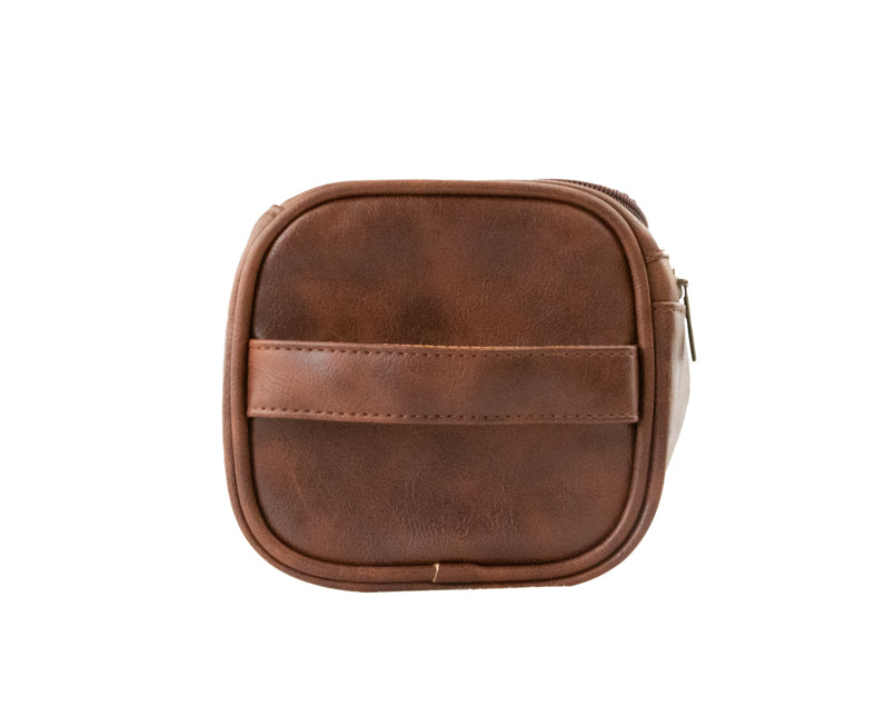 Brown Garzini Toiletry Bag side view, highlighting sleek design and travel-friendly features for frequent travelers.