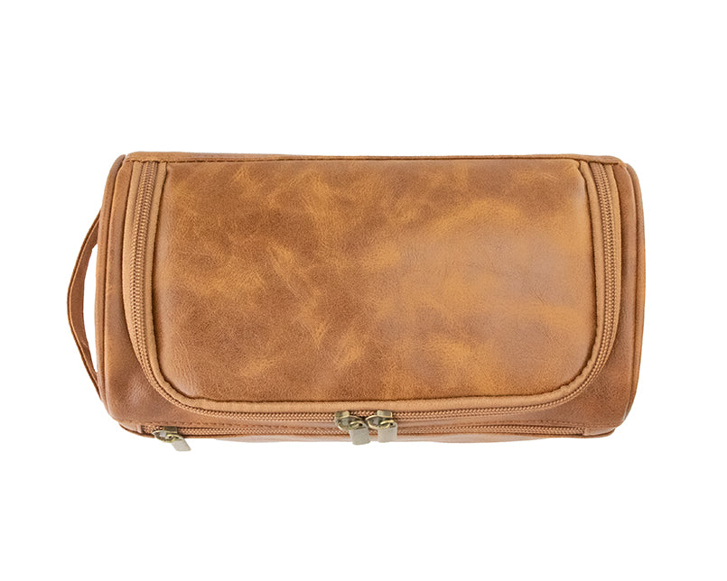 Overhead view of Cognac Garzini Toiletry Bag, showing multiple compartments for organized travel packing.