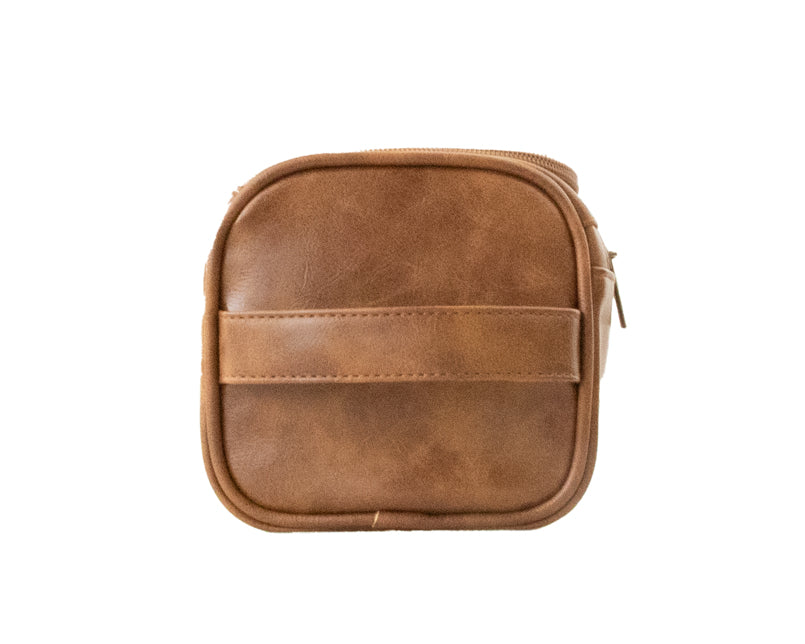 Cognac Garzini Toiletry Bag side view, designed for durability, waterproof protection, and stylish portability.