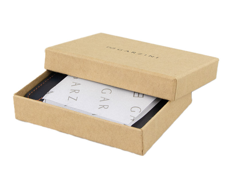 Garzini Urban Magic Wallet in black leather presented in an elegant gift box, ready for gifting.