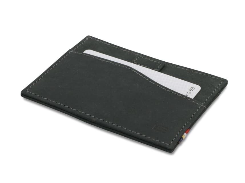 Front view of Leggera Card Holder Vintage in Carbon Black with a pull tab with a card.