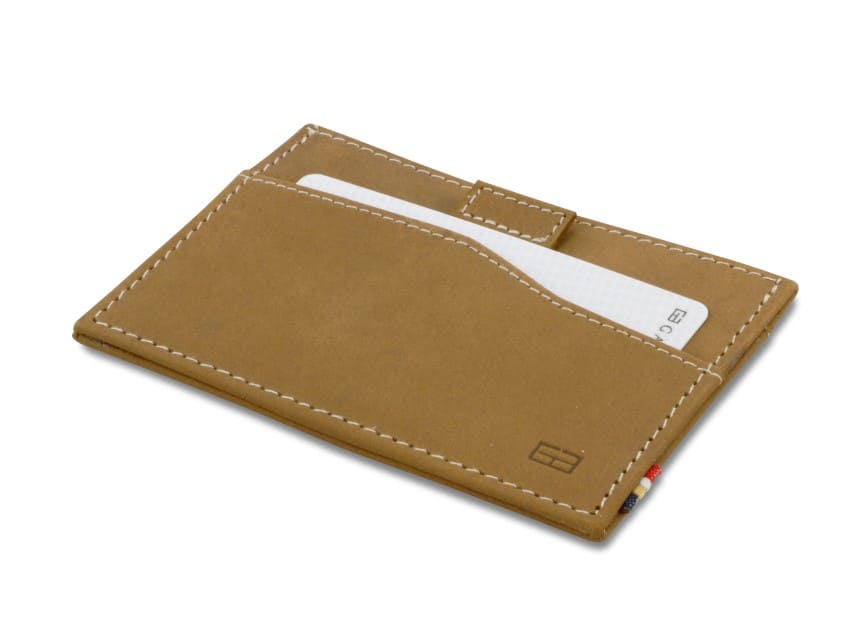 Front view of Leggera Card Holder Vintage in Camel Brown with a pull tab with money.