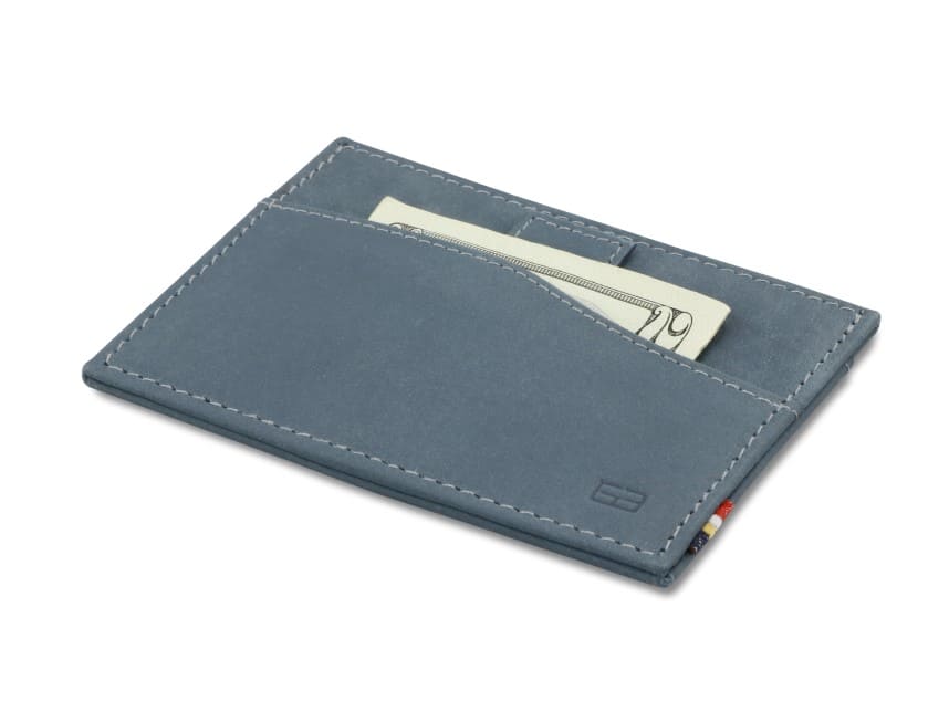 Front view of Leggera Card Holder Vintage in Sapphire Blue with a pull tab with money.
