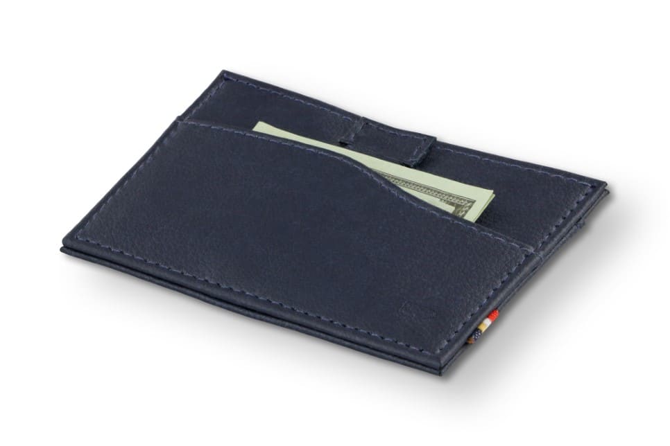 Front view of Leggera Card Holder Vegan in Cactus Blue with a pull tab with money.