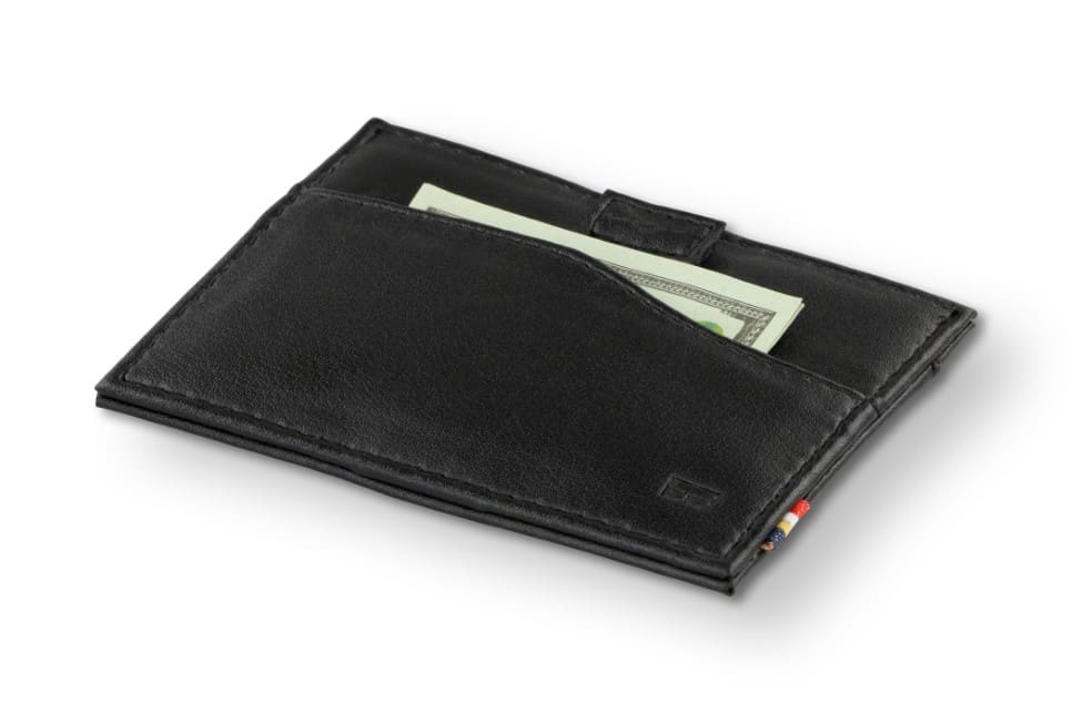 Front view of Leggera Card Holder Vegan in Cactus Black with a pull tab with money.