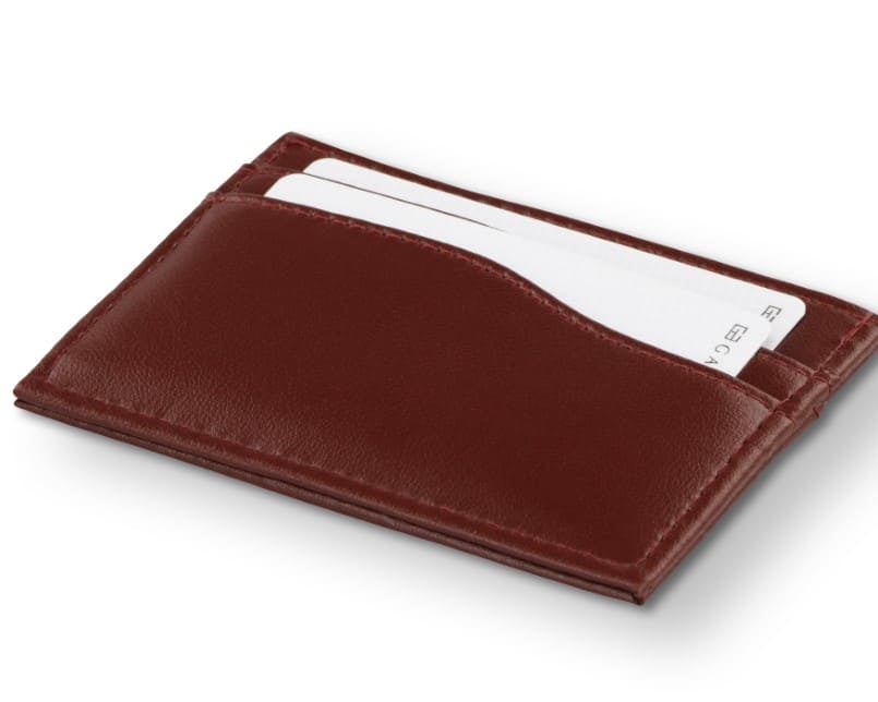 Front view of Leggera Card Holder Vegan in Cactus Burgundy with a pull tab with a card.
