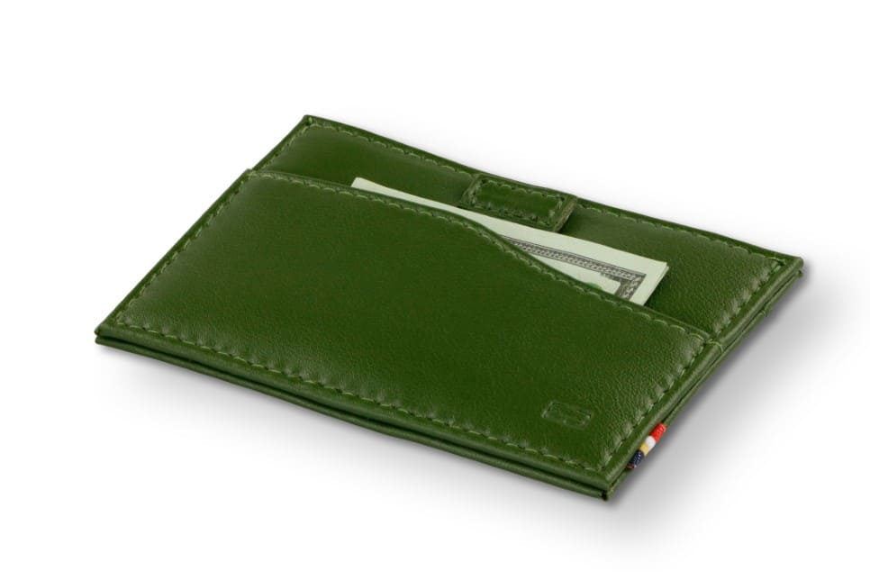 Front view of Leggera Card Holder Vegan in Cactus Green with a pull tab with money.