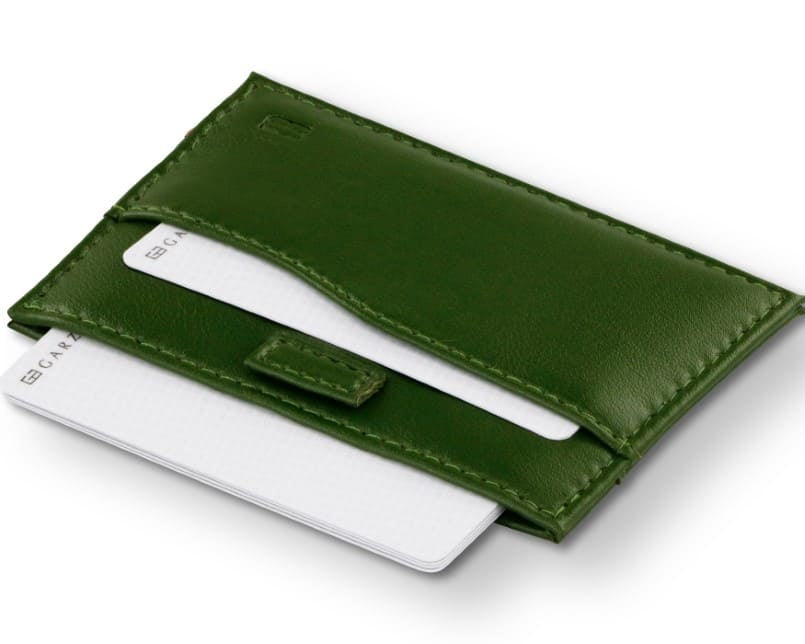 Open Leggera Card Holder Vegan in Cactus Green with cards pulling out.