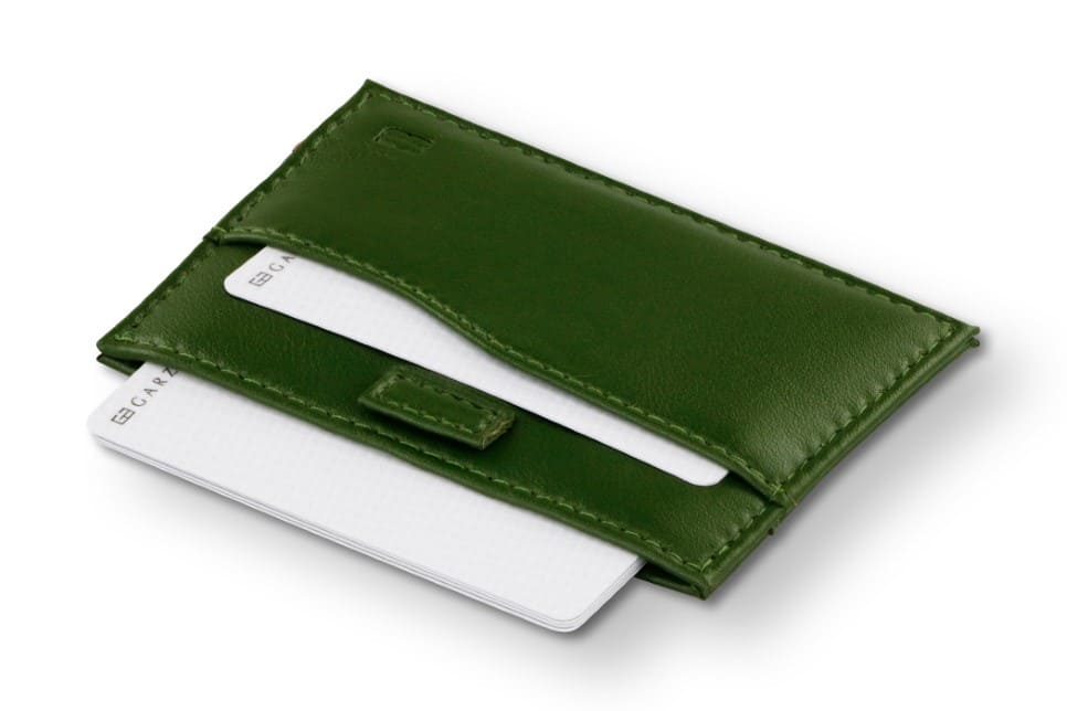 Open Leggera Card Holder Vegan in Cactus Green with cards pulling out.