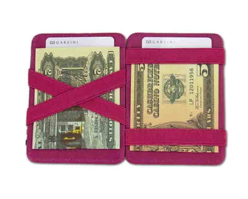 Open view of the Urban Magic Wallet in Raspberry with money. 