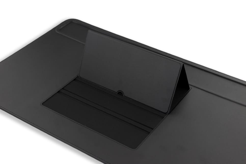 adjustable device holder on desk mat