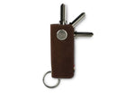 Front view of Lusso Vintage Key Holder in Brushed Brown with with a key holder ring and 3 keys. 