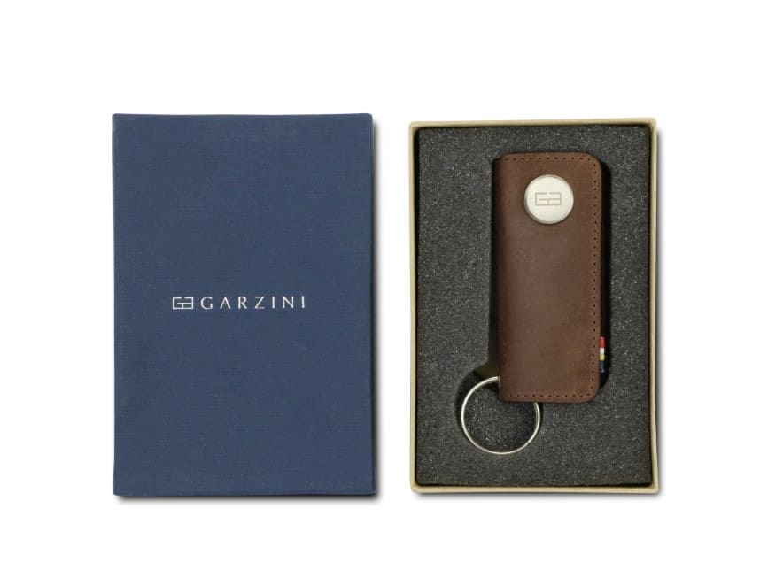 Front view of the Lusso Vintage Key Holder in Brushed Brown in the box with the brand name Garzini. 