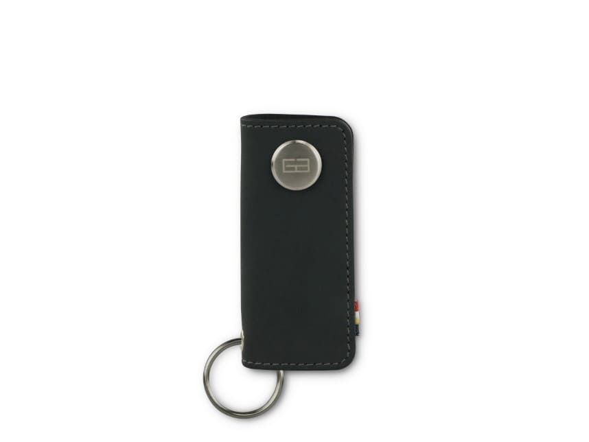 Front view of Lusso Key Holder in Carbon Black with with a key holder ring.