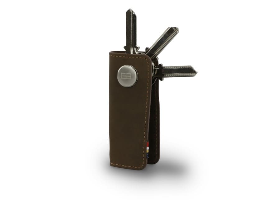 Side view of Lusso Key Holder in Java Brown with with a key holder ring and 3 keys. 