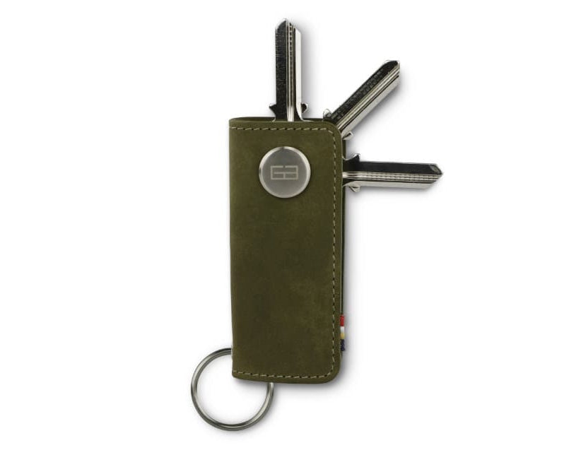 Front view of Lusso Key Holder in Olive Green with with a key holder ring and 3 keys. 