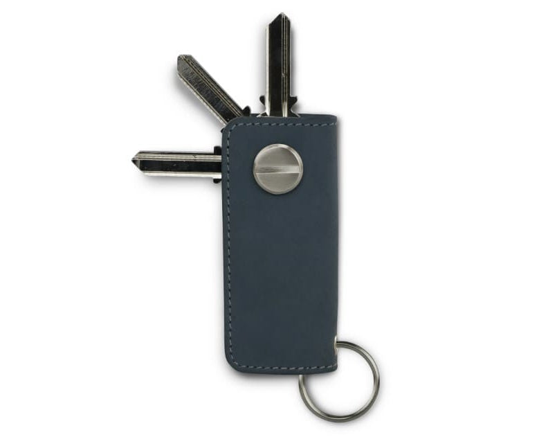 Back view of Lusso Key Holder in Sapphire Blue with with a key holder ring and 3 keys. 