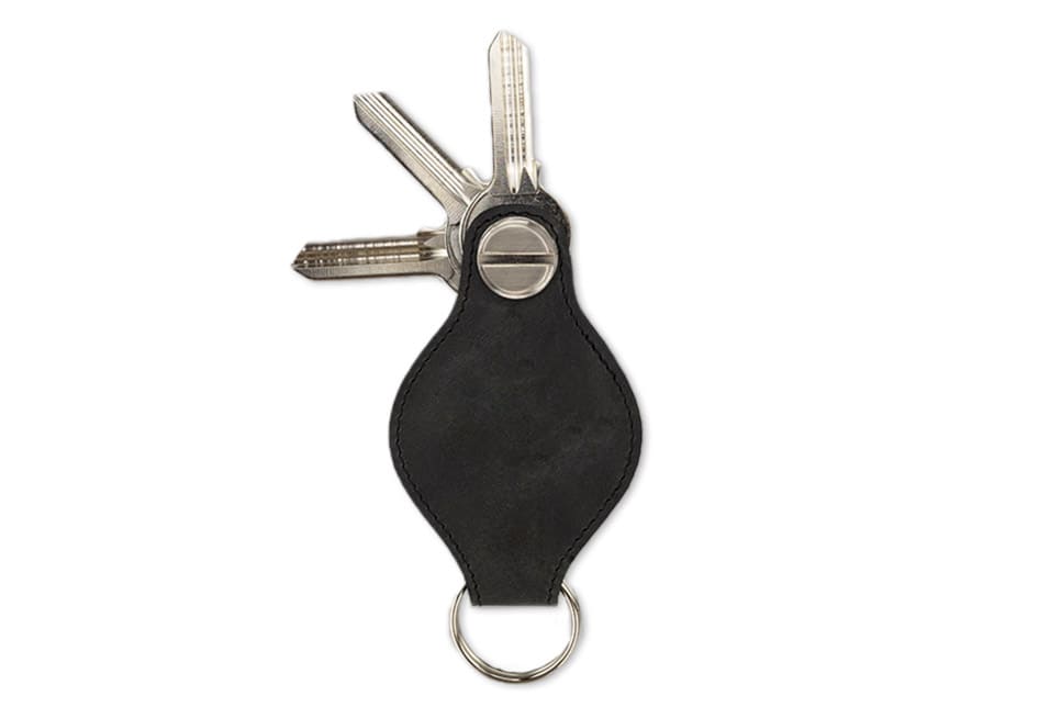 Back view of Lusso AirTag Key Holder in Brushed Black with a key holder ring and 3 keys.