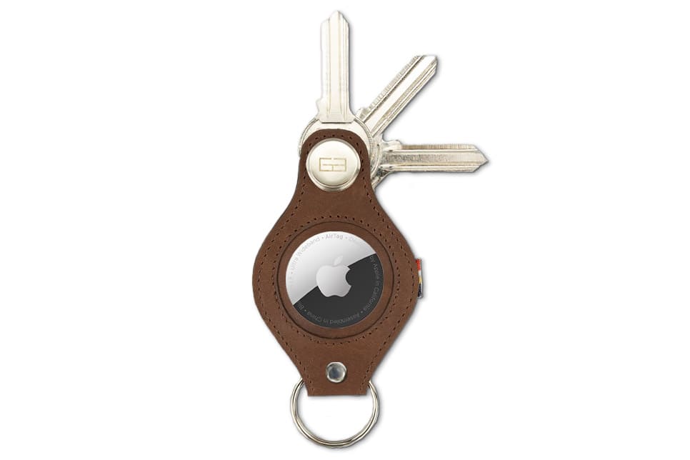Front view of Lusso AirTag Key Holder in Brushed Brown with a key holder ring and 3 keys.