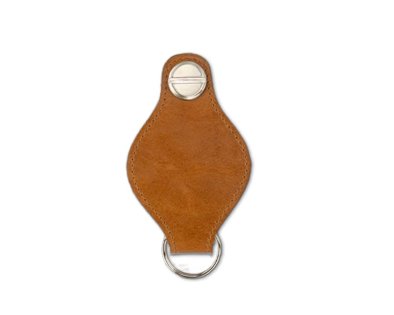 Back view of Lusso AirTag Key Holder in Brushed Cognac with a key holder ring.