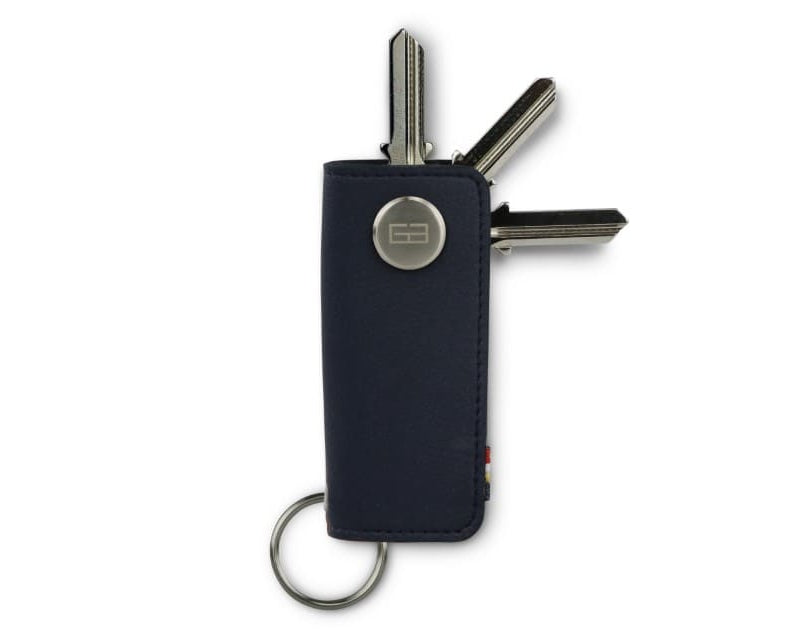 Front view of Lusso Key Holder Vegan in Cactus Blue with with a key holder ring and 3 keys. 