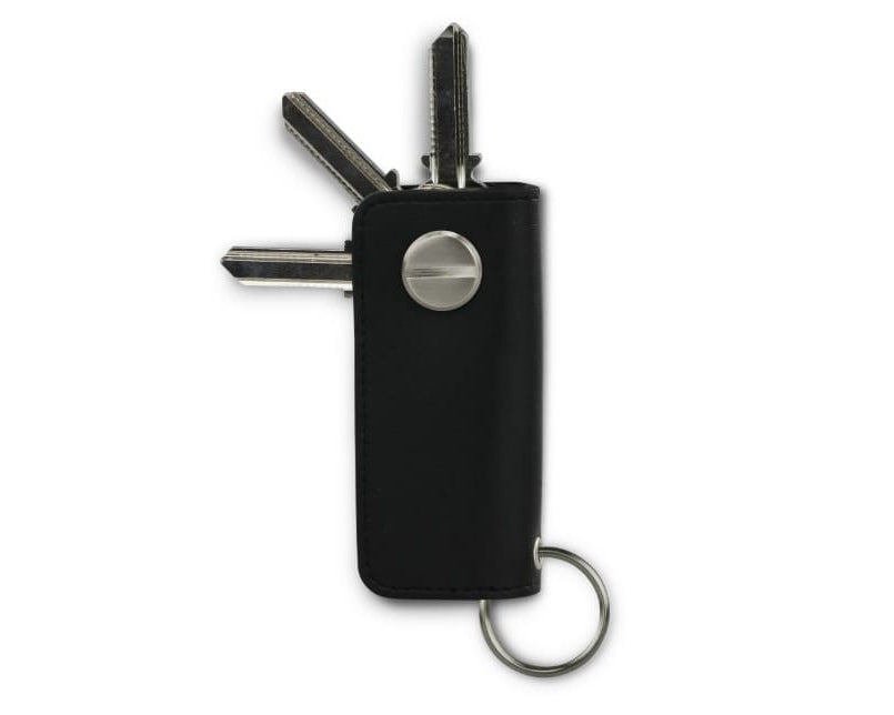 Back view of Lusso Key Holder Vegan in Cactus Black with with a key holder ring and 3 keys. 