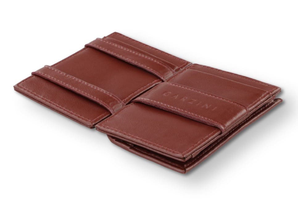 Open view of the  Essenziale Magic Coin Wallet Vegan in Cactus Burgundy with the money strap to secure money.