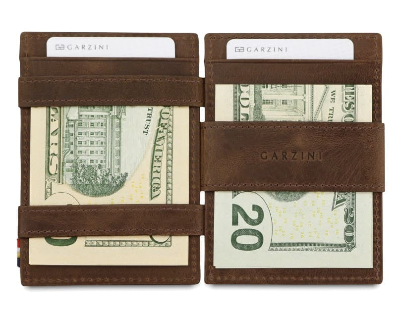 Open view of Cavare Magic Coin Wallet Card Sleeve Brushed  in Brushed Brown with money inside.