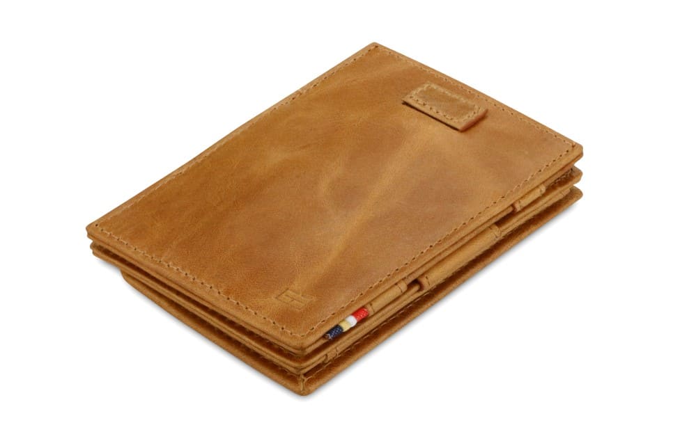 Front view of Cavare Magic Coin Wallet Card Sleeve Brushed in Brushed Cognac with pull tab.