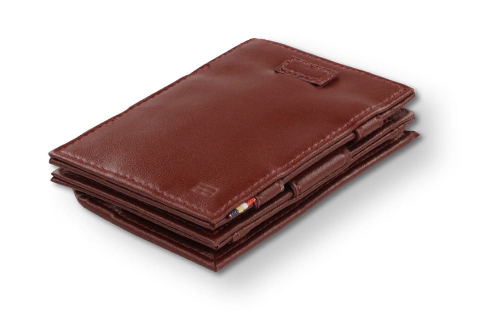 Front view of Cavare Magic Coin Wallet Card Sleeve Vegan in Cactus Burgundy with pull tab.