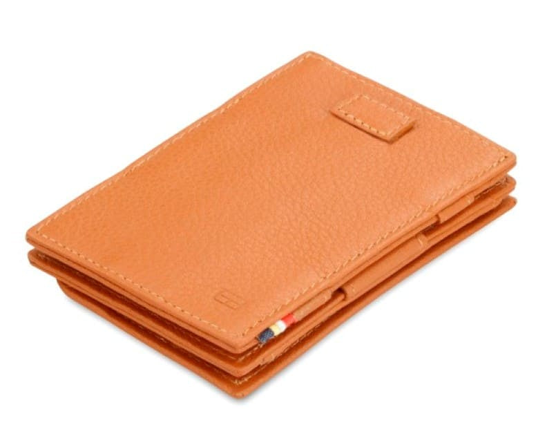 Front view of Cavare Magic Coin Wallet Card Sleeve Nappa in Cognac Brown with pull tab.
