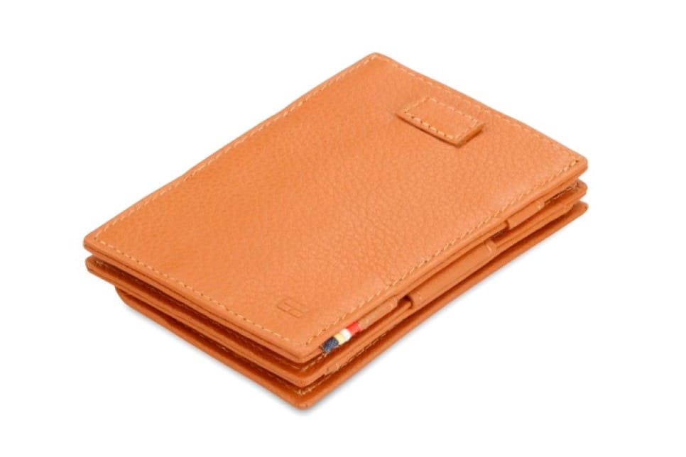 Front view of Cavare Magic Coin Wallet Card Sleeve Nappa in Cognac Brown with pull tab.