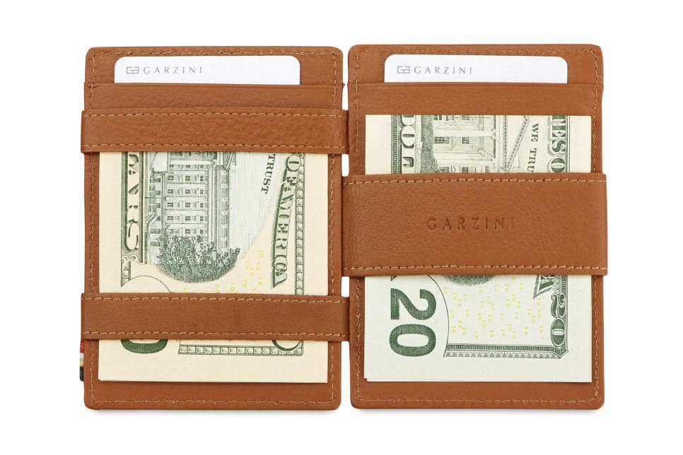 Open view of Cavare Magic Coin Wallet Card Sleeve Nappa  in Cognac Brown with money inside.