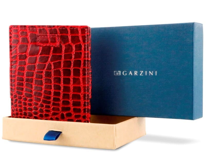 Half-open blue box with Garzini brand name Inside the box, the Burgundy wallet is wrapped in tissue paper, placed in a light cardboard box with a blue strap.