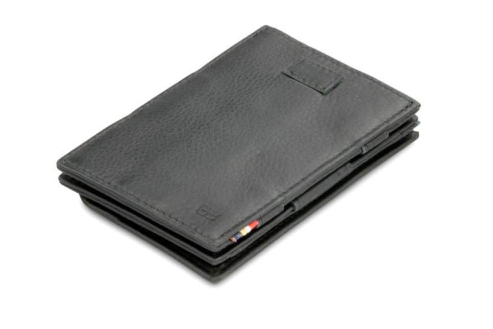 Front view of Cavare Magic Coin Wallet Card Sleeve Nappa in Raven Black with pull tab.